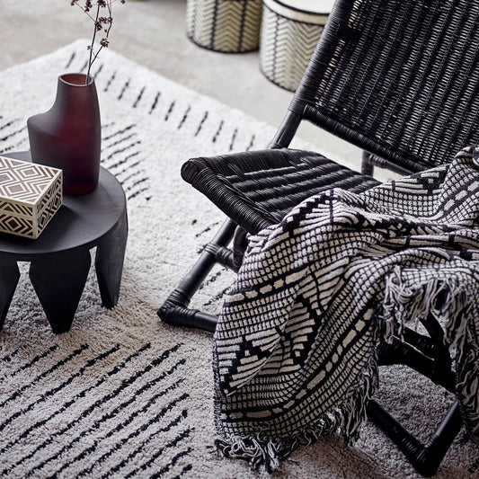 black and cream throw