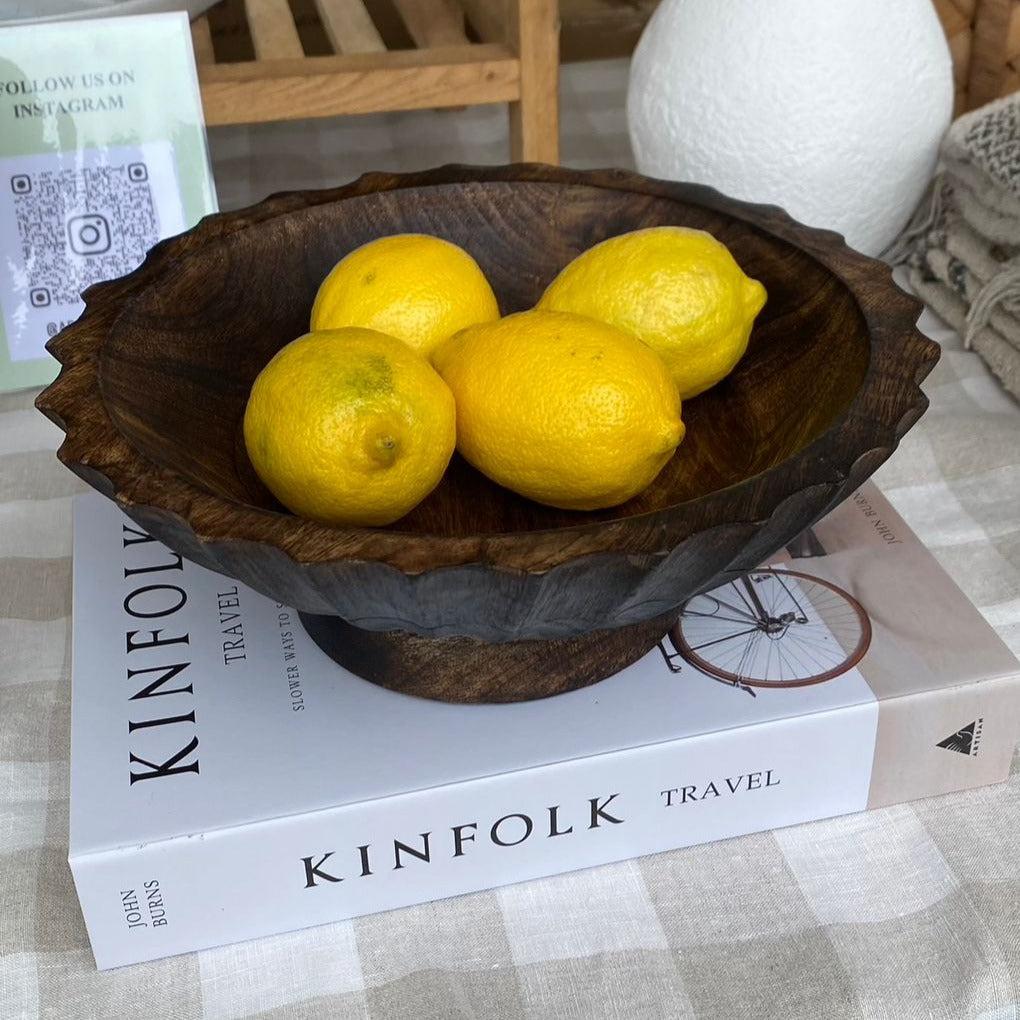 dark wood round bowl with scaloped edge