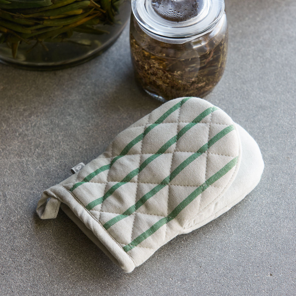 green striped oven glove