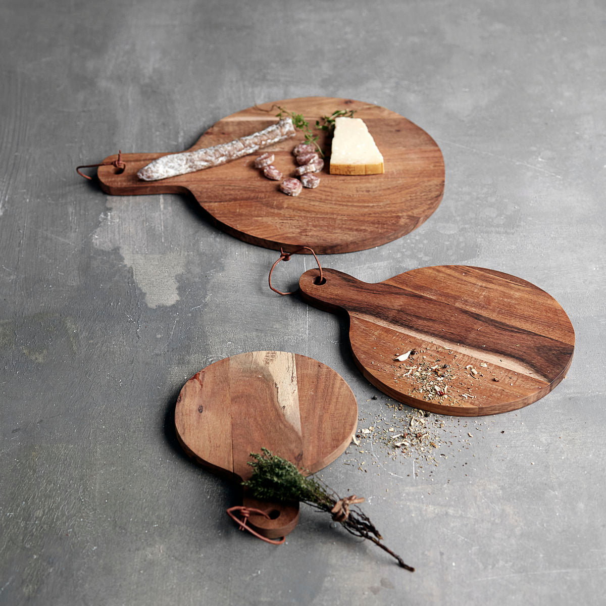 nordic set of 2 round wooden chopping boards 